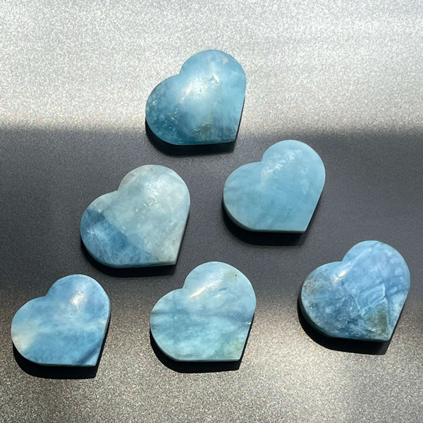 Aquamarine Heart Crystal Held in Palm