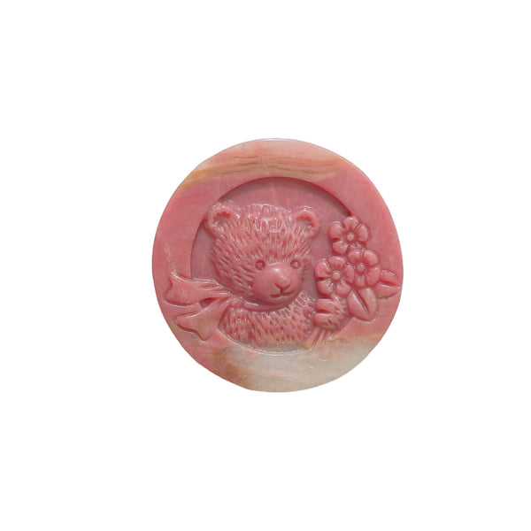 Front view of bear shape rhodonite carving showing detailed features