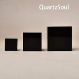 Elegant black crystal display stands in three sizes for spheres and gemstones