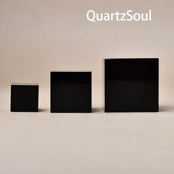 Elegant black crystal display stands in three sizes for spheres and gemstones