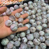 Bulk collection of Blossom Agate crystal spheres for wholesale crystal suppliers and retailers