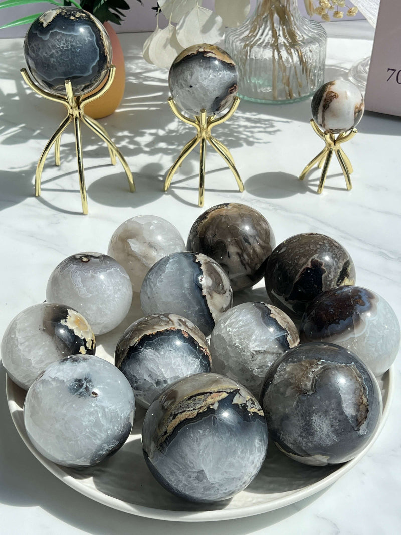 Blue Volcanic Agate Crystal Sphere on Display Stand