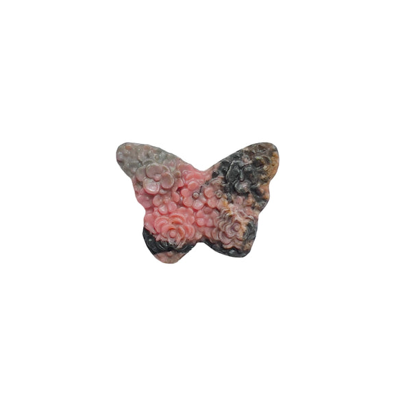 Color variations in rhodonite butterfly carving from soft pink to deeper rose tones
