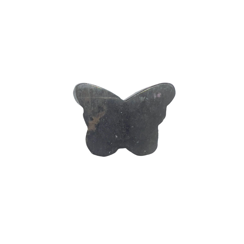Light reflection highlighting the pink tones of rhodonite butterfly carving