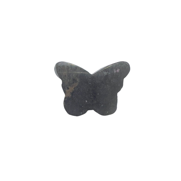 Light reflection highlighting the pink tones of rhodonite butterfly carving