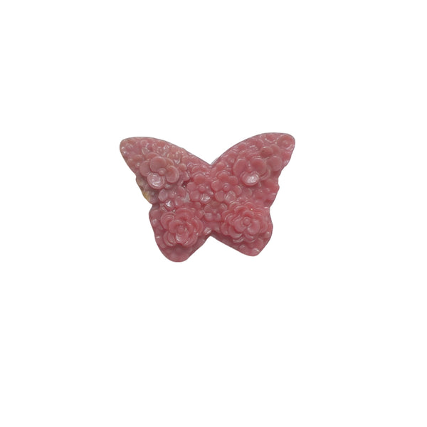 Beautiful pink butterfly rhodonite carving with natural patterns and healing properties