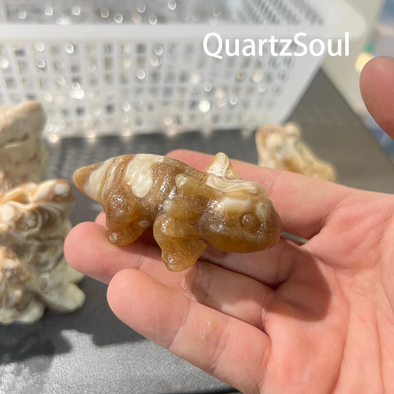 Honey-colored calcite salamander carving for crystal wholesale buyers