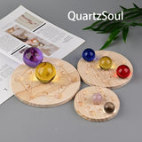 Wooden crystal ball stand with sacred geometry sun and moon phases design