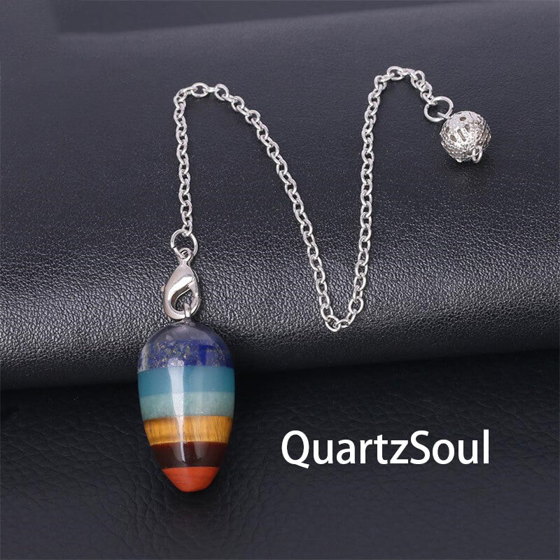 Oval chakra pendulum crystal necklace with silver chain and decorative charm