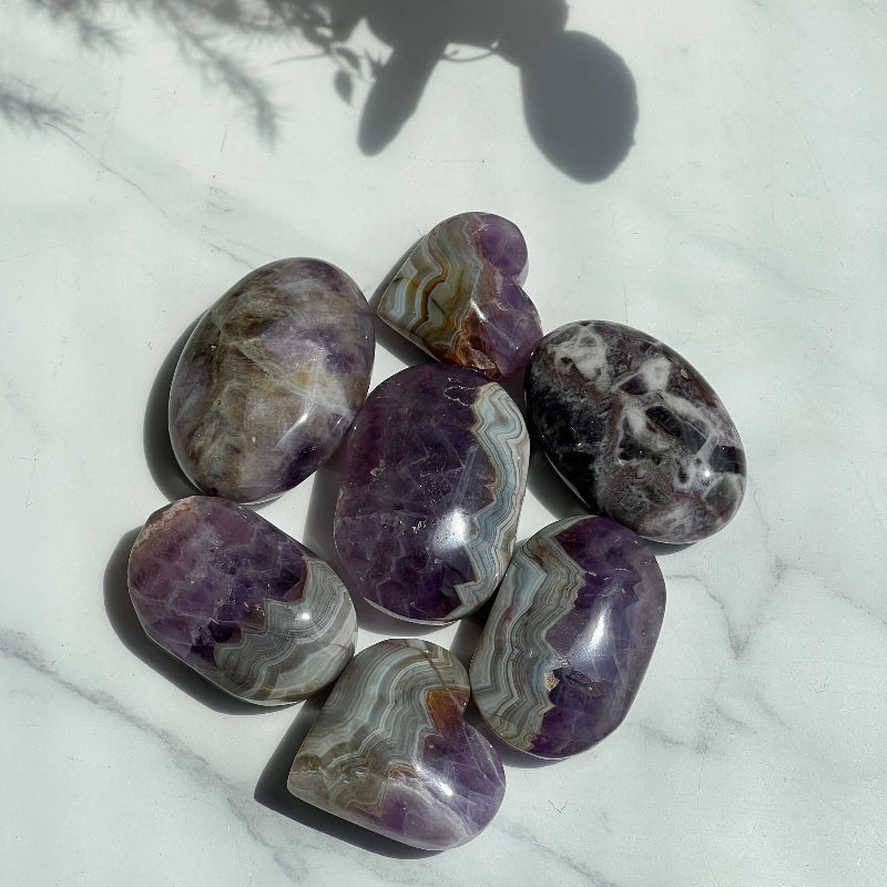 Wholesale Collection of Chevron Amethyst Palm Stones for Crystal Suppliers