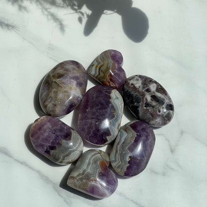 Wholesale Collection of Chevron Amethyst Palm Stones for Crystal Suppliers