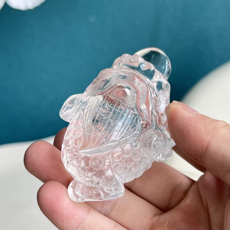 Close-up of clear quartz clarity and natural inclusions in toad carving