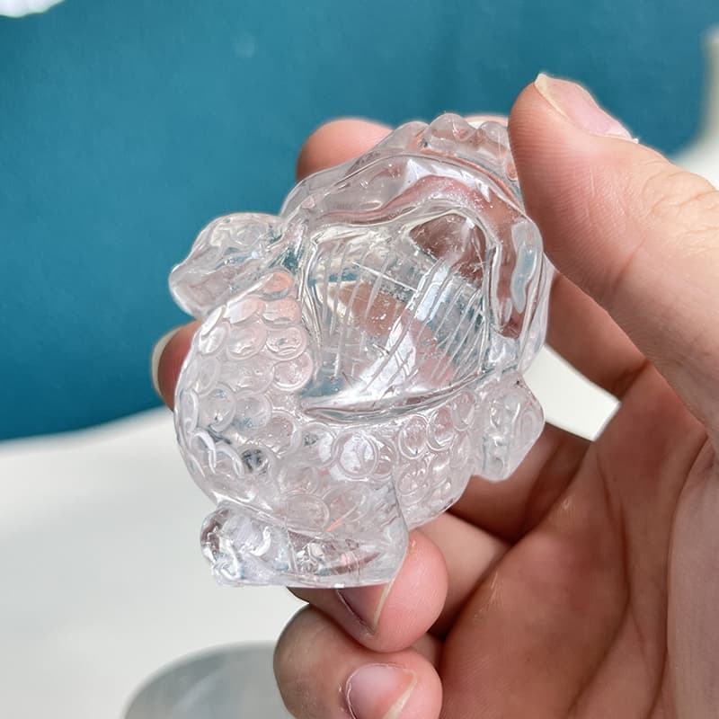 Feng shui placement options for clear quartz golden toad carvings