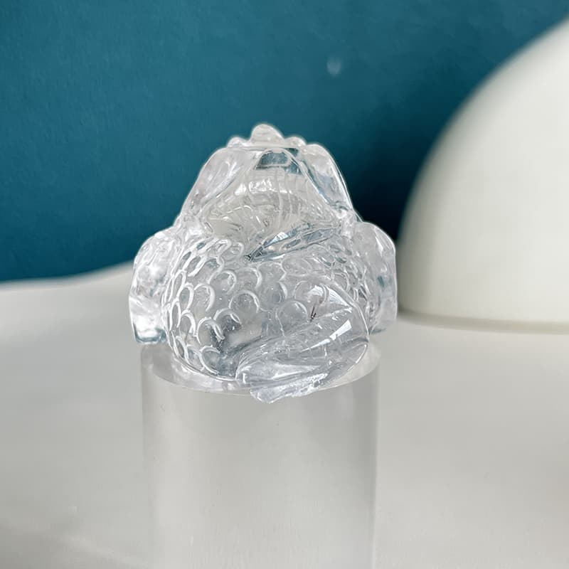 Crystal golden toad placed in feng shui wealth corner arrangement