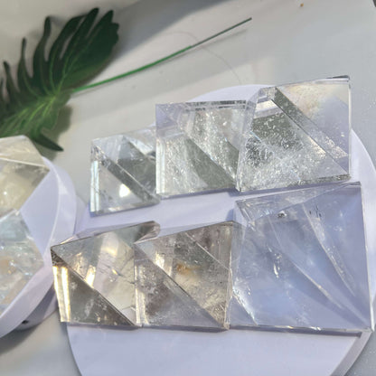 Wholesale clear quartz pyramids showing relative sizes