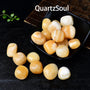 Premium Cream Yellow Jade tumbled stones arranged in black display dish