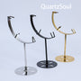 Collection of crystal display stands in silver, black and gold finishes for showcasing spheres and minerals