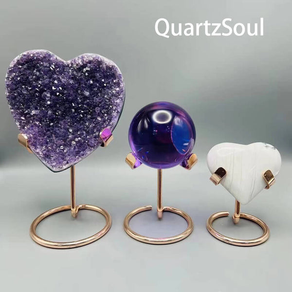 Crystal love bracket stands displaying amethyst heart, purple sphere and selenite heart