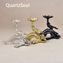Fish skeleton crystal sphere stands in three metallic finishes for mineral display