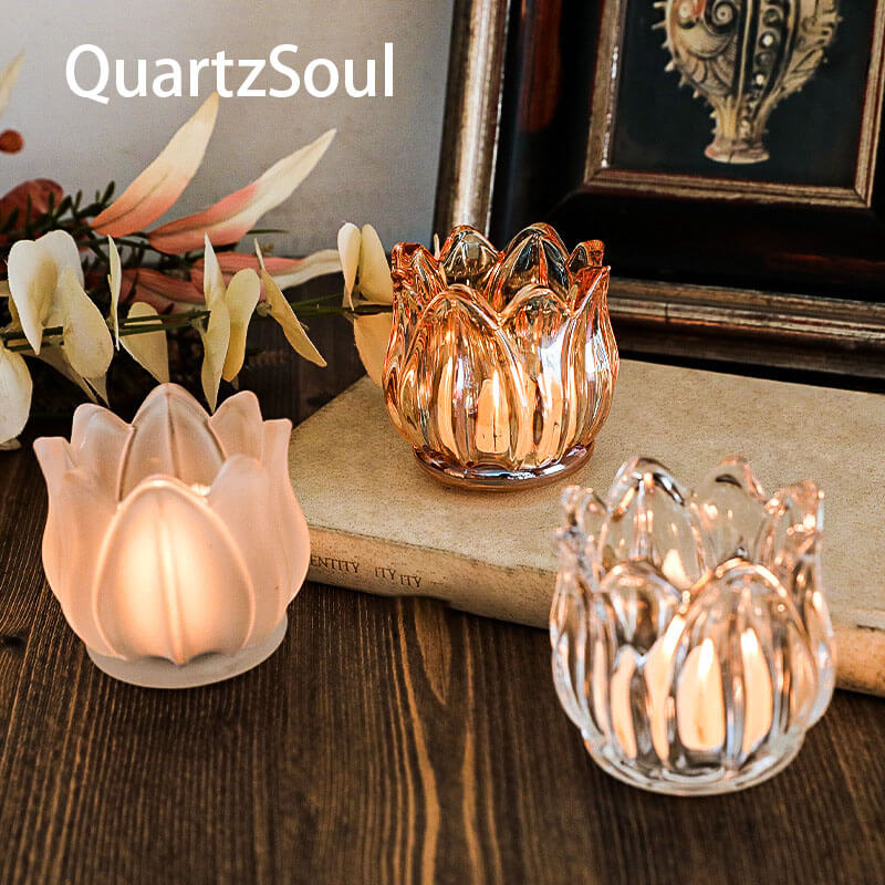 Complete collection of crystal tulip candle holders in transparent, brown, and frosted finishes