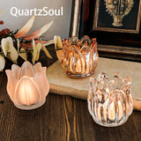 Complete collection of crystal tulip candle holders in transparent, brown, and frosted finishes