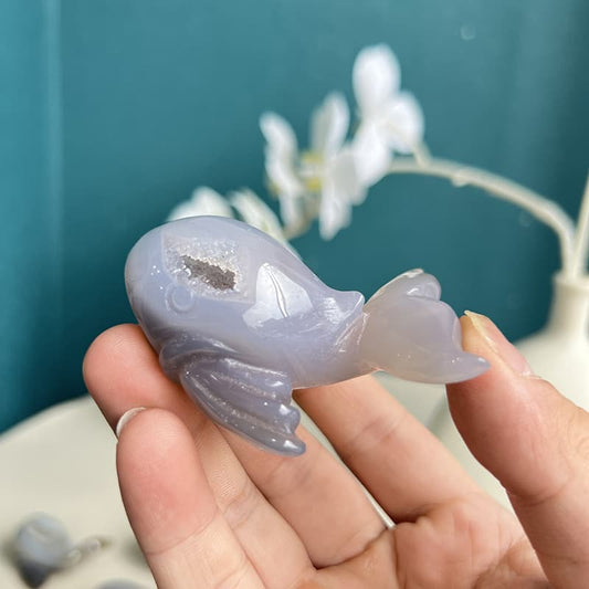 Natural dolphin agate crystal carving with bluish-gray translucent color