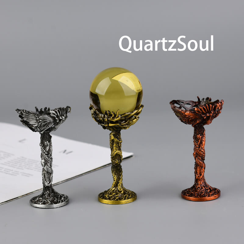 Elegant dragon crystal ball stands in silver, gold, and rose gold finishes for displaying crystal spheres and mineral specimens