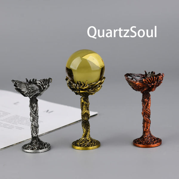 Elegant dragon crystal ball stands in silver, gold, and rose gold finishes for displaying crystal spheres and mineral specimens
