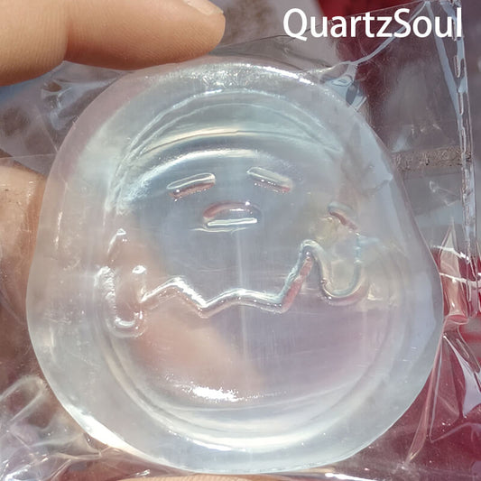 Premium eggshell selenite crystal with carved face for wholesale crystal suppliers