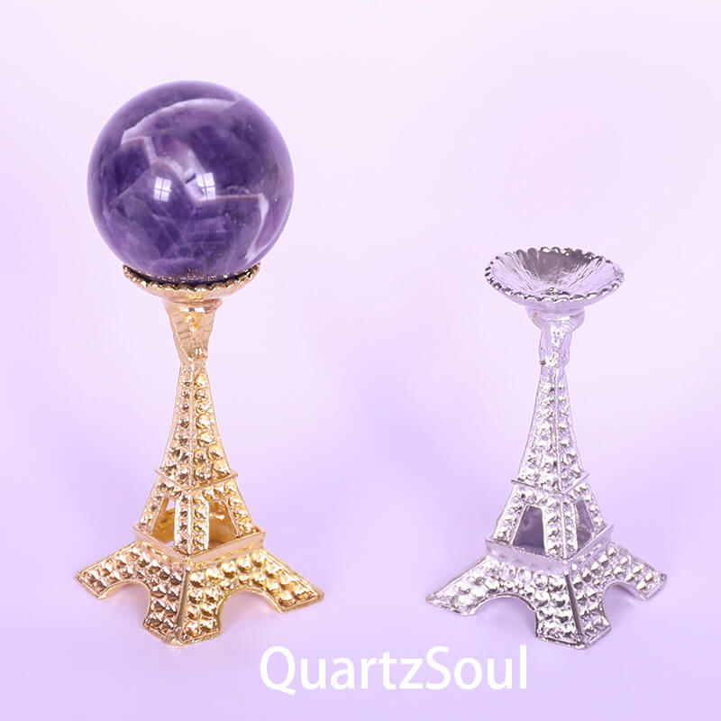 Eiffel Tower crystal stand displaying beautiful amethyst sphere healing crystal