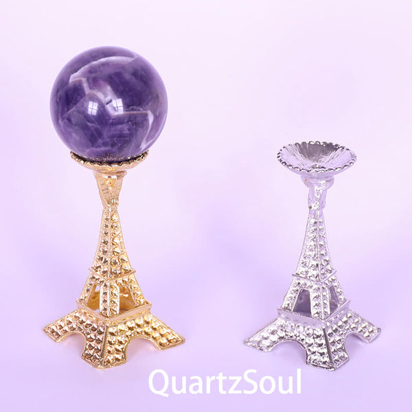 Eiffel Tower crystal stand displaying beautiful amethyst sphere healing crystal