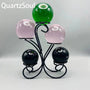 Elegant flower-shaped crystal ball stand with multiple sphere holders in black metal finish