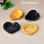 Elegant heart-shaped crystal ball display stand in black finish for spheres and minerals