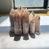 Polished Flower Agate Crystal Tower showing natural inclusions