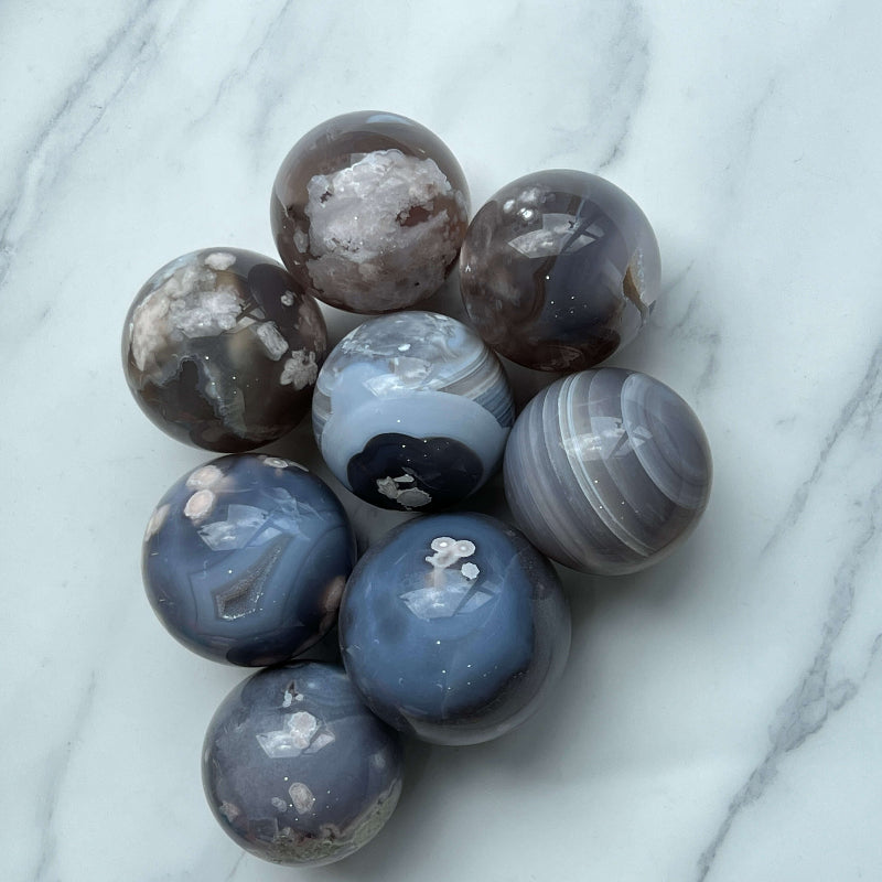 Flower Agate Sphere used in crystal healing practice
