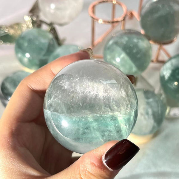 Healing properties of light green fluorite crystal sphere