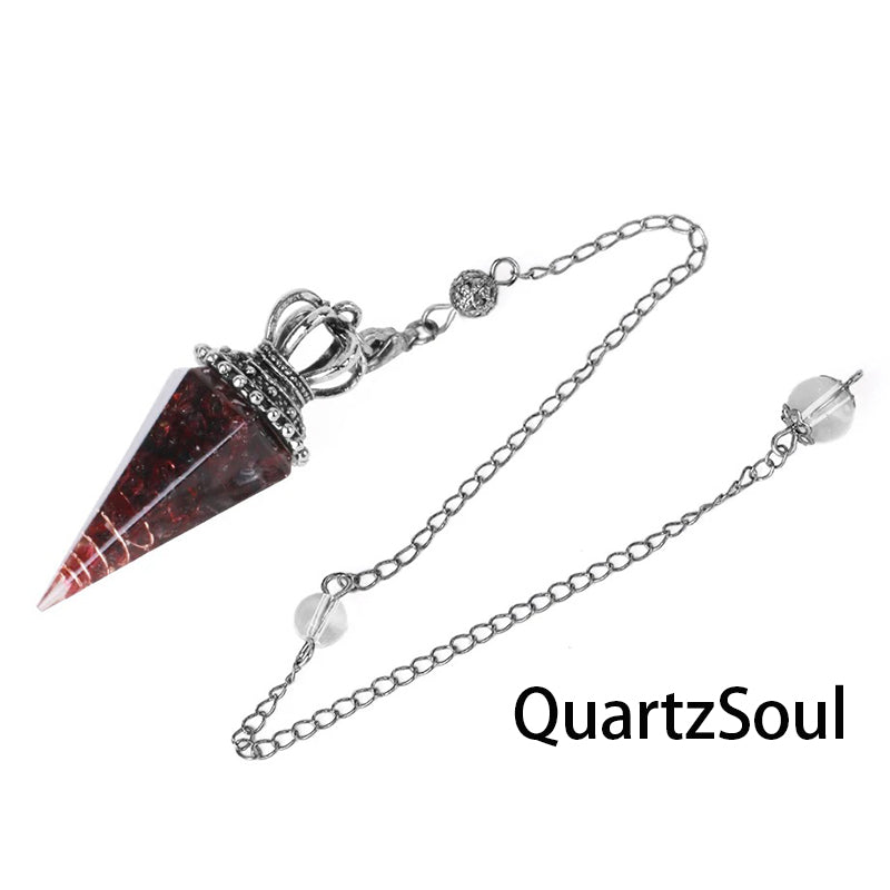 Garnet crystal pendulum with royal silver crown topper