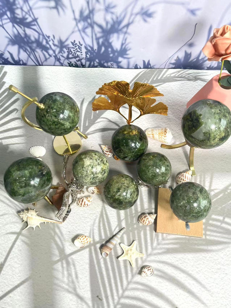 Premium Green Apidote Crystal Sphere with vibrant green color and natural healing properties