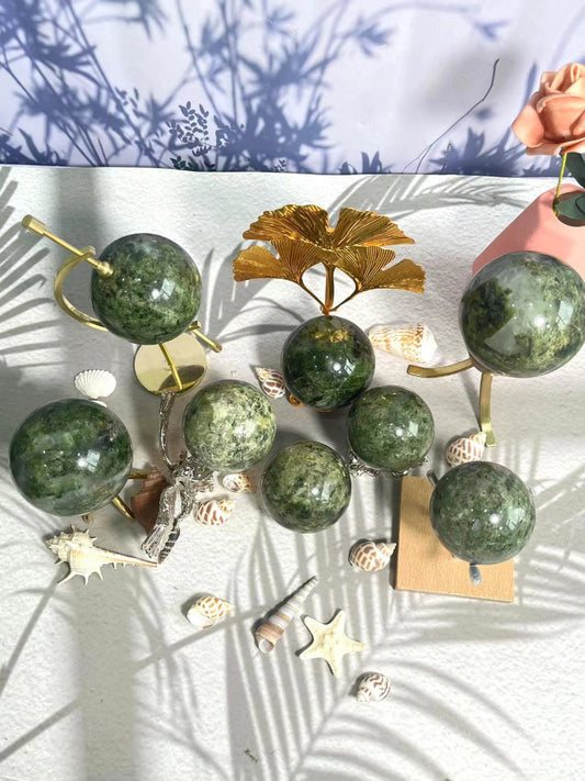 Premium Green Apidote Crystal Sphere with vibrant green color and natural healing properties