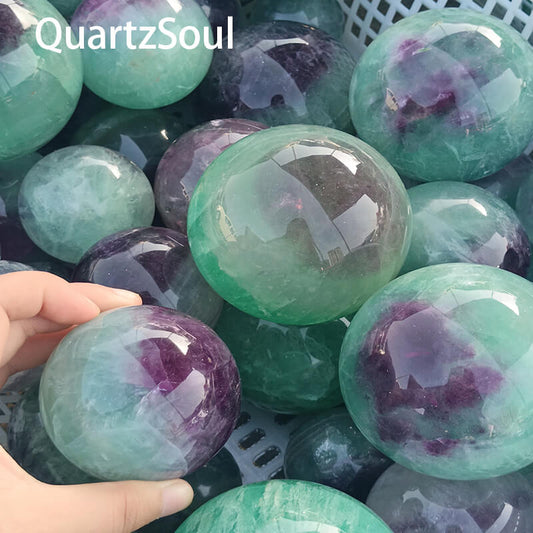 Premium Green Fluorite sphere with purple banding for wholesale crystal supply