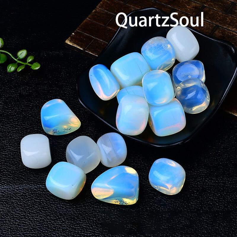 Natural opalite tumbled crystal stones arranged for healing and meditation