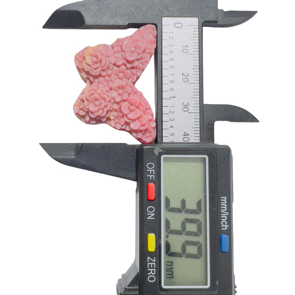 Energy properties of rhodonite butterfly carving for emotional balance
