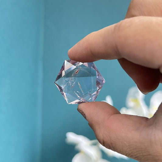 Natural hexagram fluorite crystal carving with geometric precision