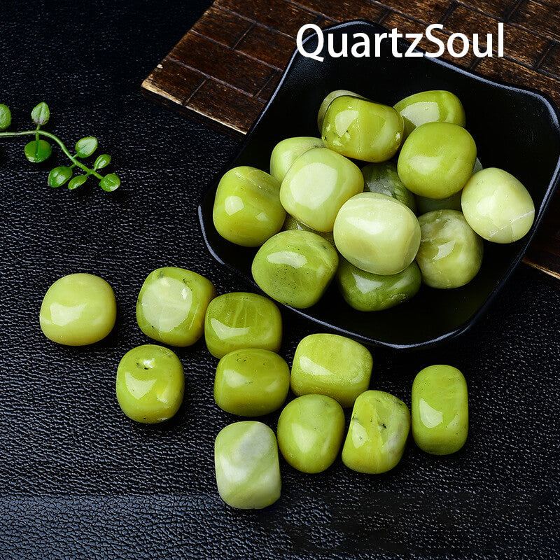 Polished Lemon Jade Tumbled Gemstones Displayed in Black Bowl
