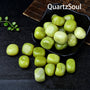 Polished Lemon Jade Tumbled Gemstones Displayed in Black Bowl