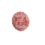Light reflection on carved rhodonite crystal magical girl pattern