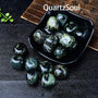  Bulk collection of Malachite tumbled stones showing variety of green patterns and sizes