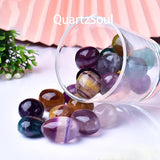 Natural Mixed Fluorite Tumbled Stones in Glass Container with Various Colors