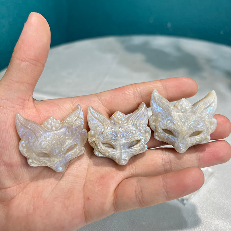Moonstone fox carving used in crystal healing grid configuration