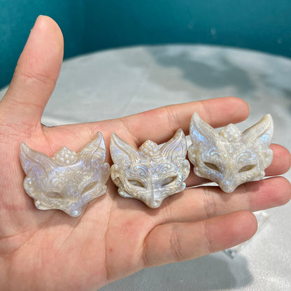 Moonstone fox carving used in crystal healing grid configuration